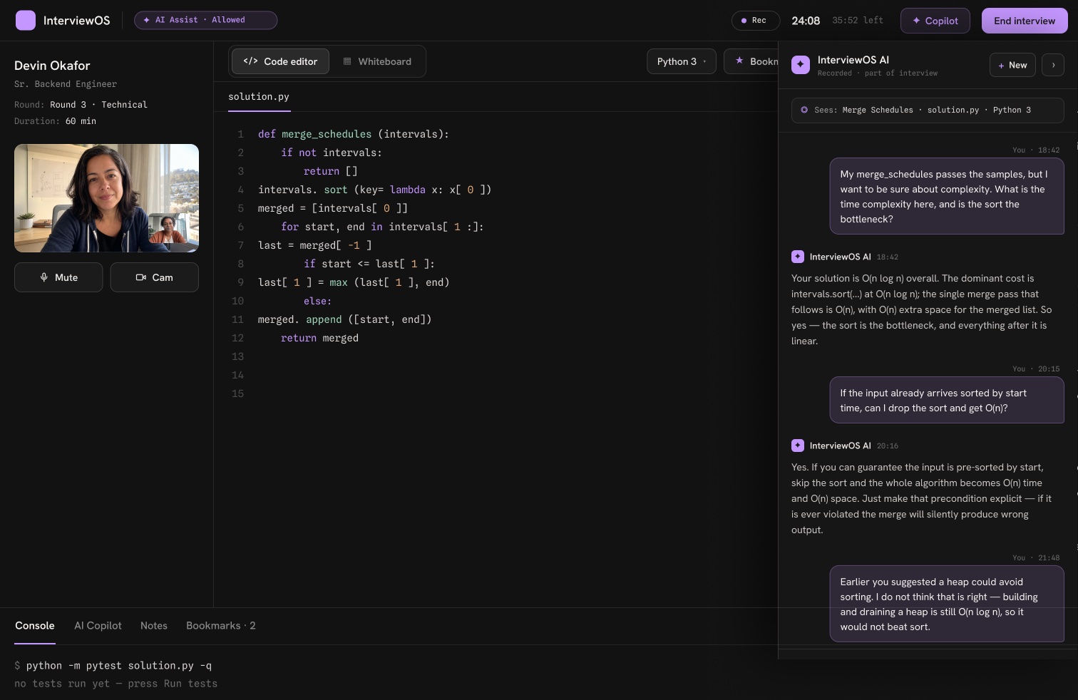 InterviewOS technical interview screen with a live code editor, AI copilot chat, and the candidate on camera